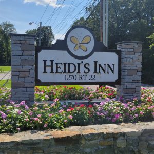 sign with flowers